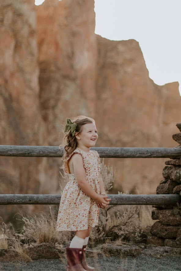 The Harper Pinafore in Mustard Floral